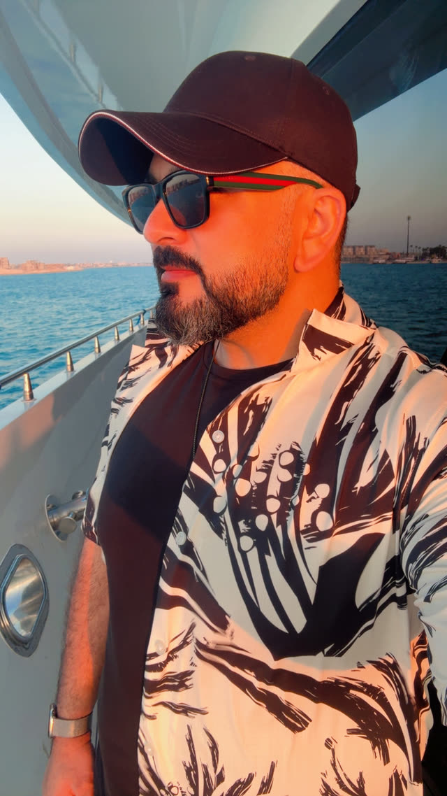 Dr. Usman at sunset on the water